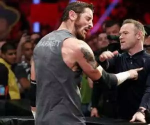 Star Footballer, Wayne Rooney Slapped WWE Wrestler, Wade Barrett In The Ring? [See Photos]